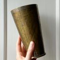 Patinated metal cup w pattern