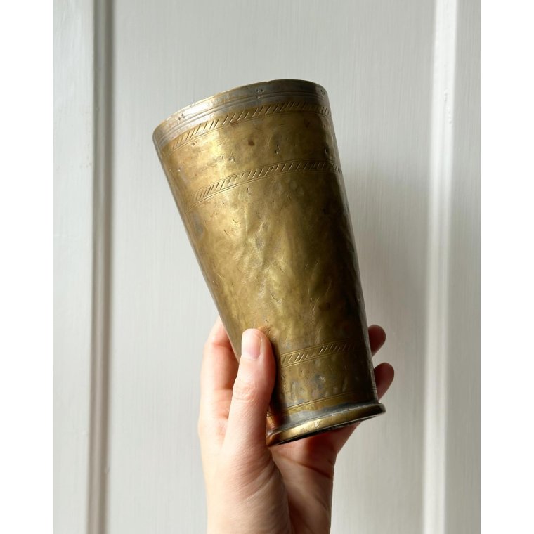 Patinated metal cup w pattern