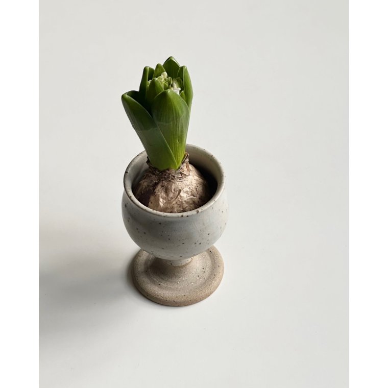 Keramikbger, vinglas, lys 