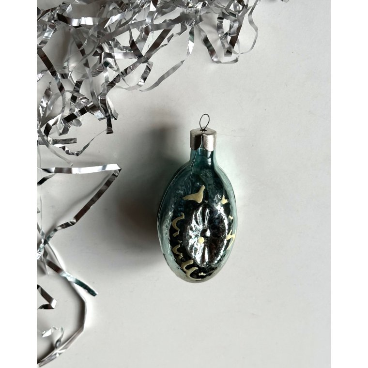 Ice blue ornament w reflector and decor