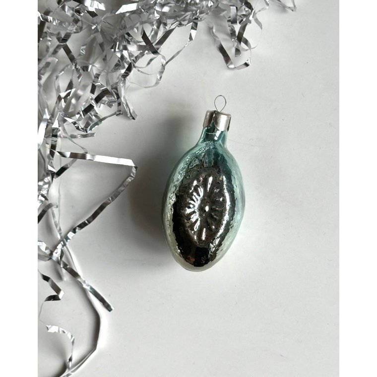 Ice blue ornament w reflector and decor