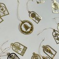 Ornaments, golden metal, set of 15