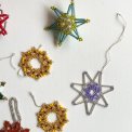 Pearl-stitched snowflakes and stars, set of 11