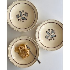 Deep faience plates, set of 3