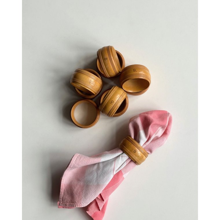 Set of wooden napkin rings, numbered
