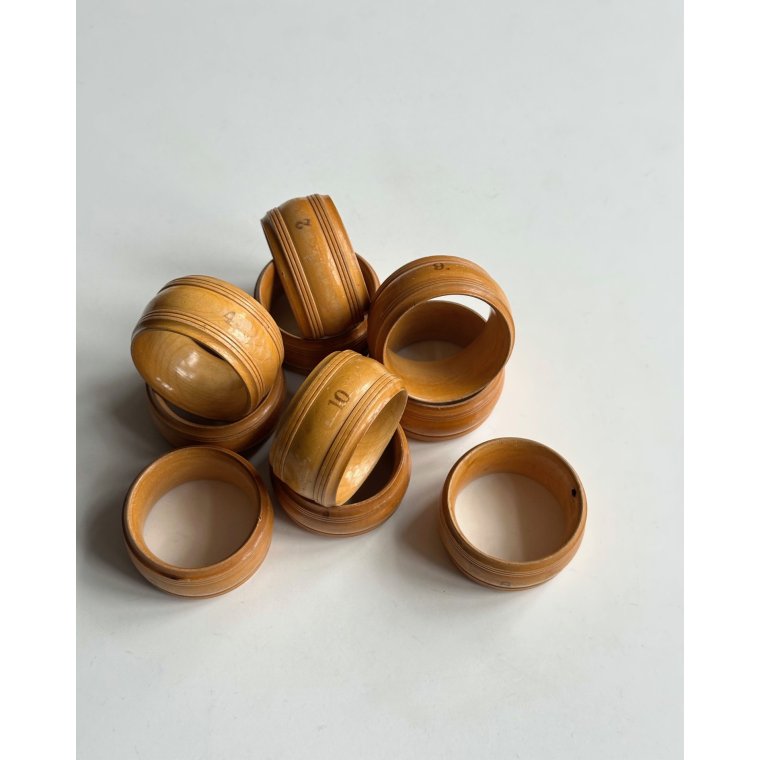 Set of wooden napkin rings, numbered