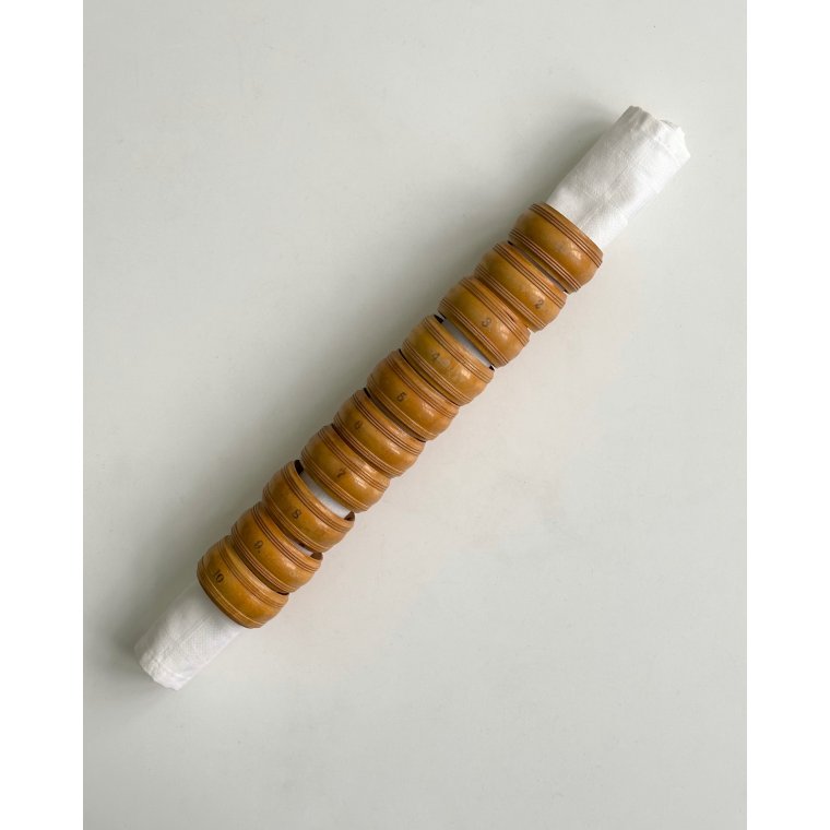 Set of wooden napkin rings, numbered