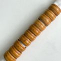 Set of wooden napkin rings, numbered