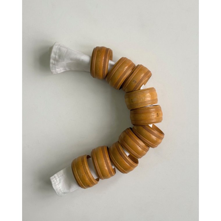 Set of wooden napkin rings, numbered