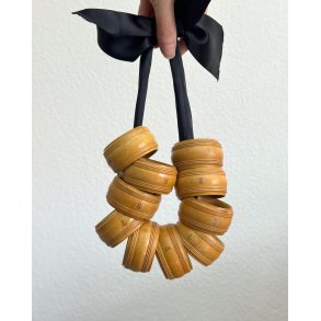 Set of wooden napkin rings, numbered