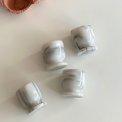Marble egg cups on foot, set of 4
