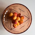 Rosy glass bowl w 3 feet