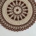 Pearl-stitched doily, brown