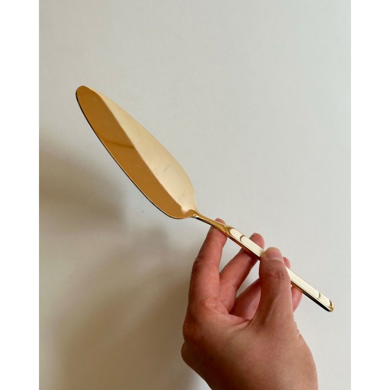 Guldbelagt kagespade