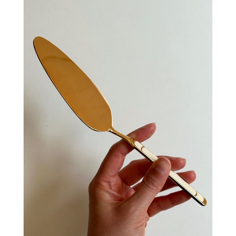 Guldbelagt kagespade