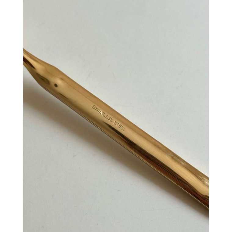 Guldbelagt kagespade