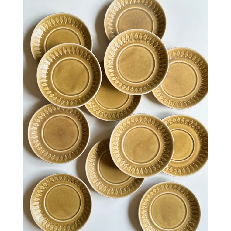 Jens Harald Quistgaard, Relief saucers, set of 12