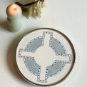 Coaster, faience and metal