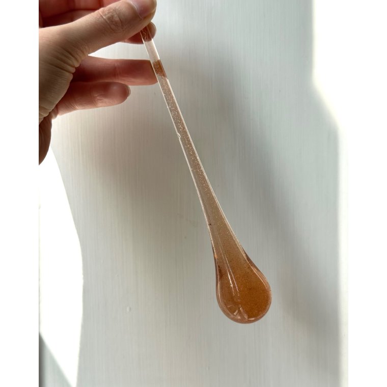 Glass drop, salmon colored