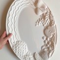 Large dish w fruit motif, faience