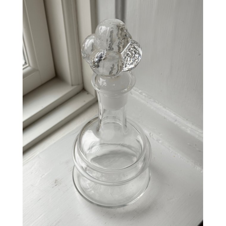 Clear glass, stopper with spheres, NB